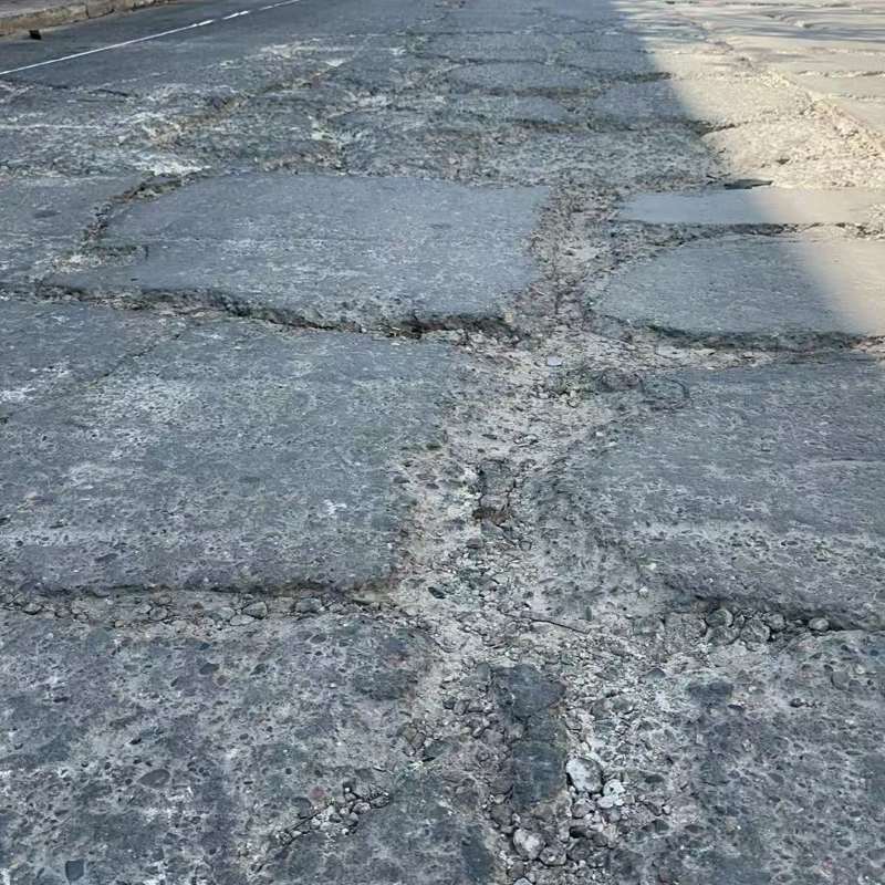 那坡路面起砂露石子修补料